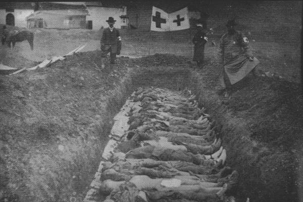 RED CROSS WORK IN CHINESE REVOLUTION  Red Cross workers at mass graves of men killed during the the Chinese Revolution.