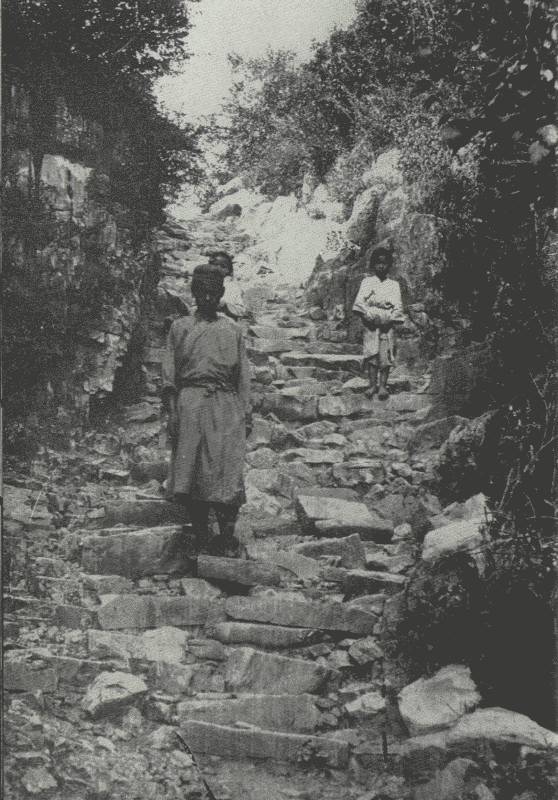 IN UNSURVEYED AND LITTLE-TRODDEN YÜN-NAN  Picture shows into what a dilapidated condition the roads are allowed to get; off courier roads, this is what you get.