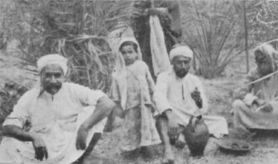 Arabs Enjoy An Al Fresco Meal Of Dates