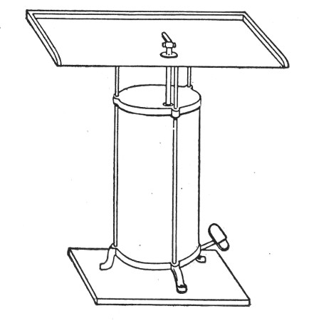 Fig. 12.—Glass blower's table with Enfer's foot bellows.