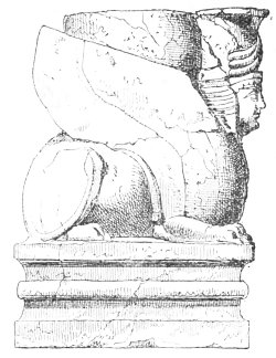 Fig. 85.—Winged Sphinx carrying the base of a column; from Layard.