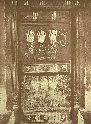 This is the tangible brass-bossed door outside of which we so often stand on the stone step and knock, and hear voices from within call, "Everyone is out." The hand-marks are the hand-prints of the Power that keeps the door shut. Once a year, every door and the lintel of every window, and sometimes the walls, are marked like this. That evening, just before dark, the god comes round, they say, and looks for his mark on the door, and, seeing it, blesses all in the house. If there is no mark he leaves a curse. This is the devil's South Indian parody on the Passover.