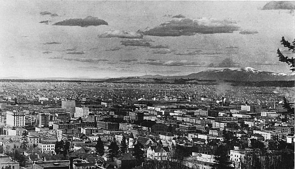 THE CITY OF SPOKANE FROM CLIFF PARK—MOUNT SPOKANE IN THE DISTANCE.