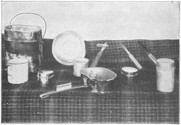 German Army cooking kit after use in five campaigns.  All of these articles pack inside the kettle