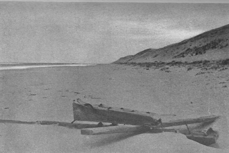 Wreckage under the sand-bluff