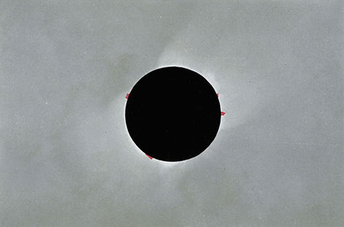 A TOTAL SOLAR ECLIPSE.  After Burckhalter's photographs of the eclipse of May 28, 1900.