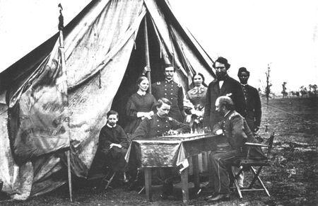 Chess, a favorite pastime in camp, finds Colonel Martin McMahon, General Sedgwick's adjutant, engaged in the contest that was a favorite of Napoleon and many other military leaders.