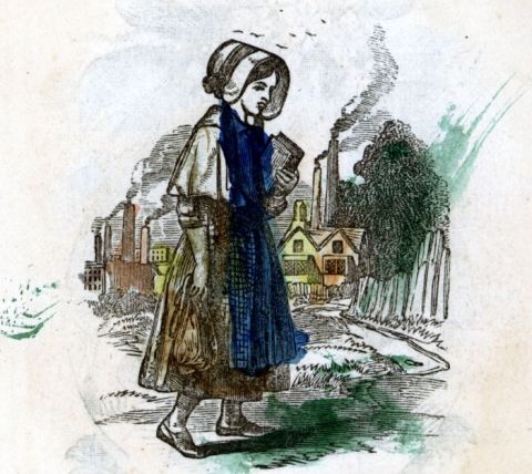 woman walking near town