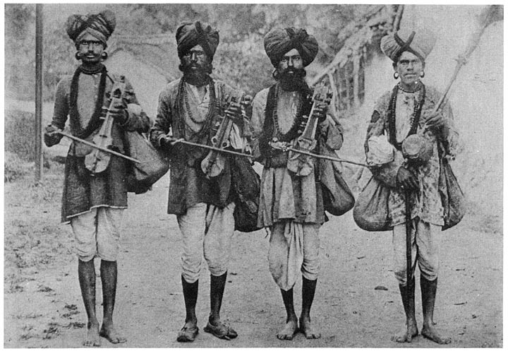 Jogi musicians with sārangi or fiddle