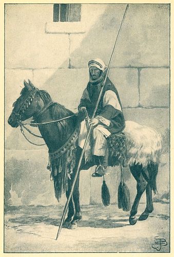 man sitting on horse