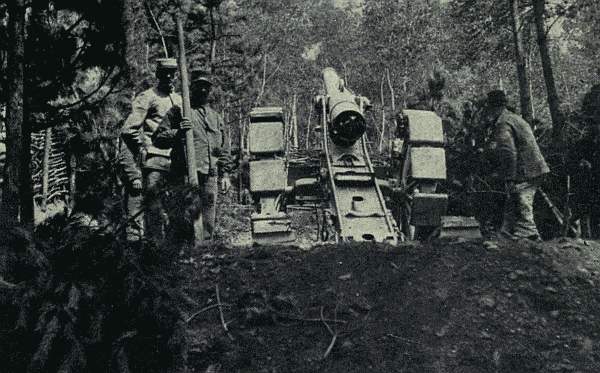 A heavy field-piece standing on treadled wheels