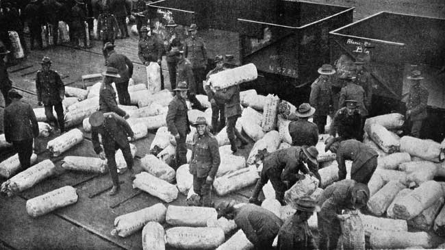 Sorting Kit-Bags alongside the "Athenic," Lyttelton