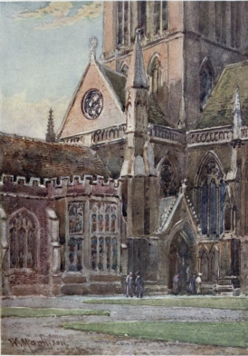 ENTRANCE TO ST. JOHN’S COLLEGE CHAPEL FROM THE FIRST COURT  In the corner on the right is seen the Doorway of the Chapel, with the tower rising above it. On the left is part of the Hall with a fine oriel window.