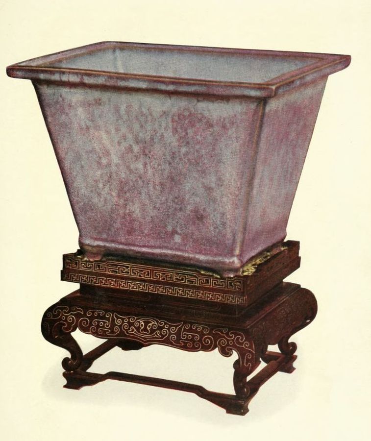 Rectangular pot on decrated stand with legs