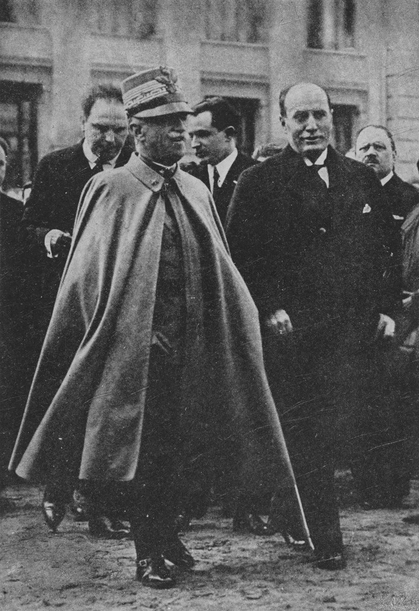 King Victor Emmanuel III and Mussolini outdoors standing side-by-side