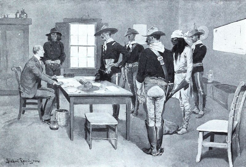 Indian agent conversing with cavalry soldiers