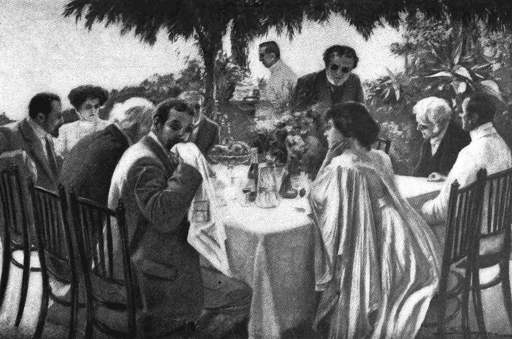 There is a group of people seated around a table outdoors, engaged in a formal meal. The setting appears to be a garden, with lush foliage in the background. The individuals are dressed in elegant attire, indicating a refined gathering.