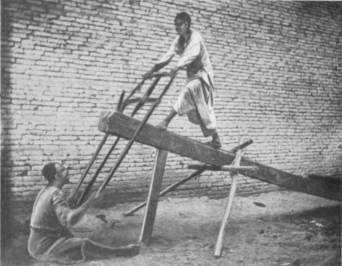 SAWING A BEAM.