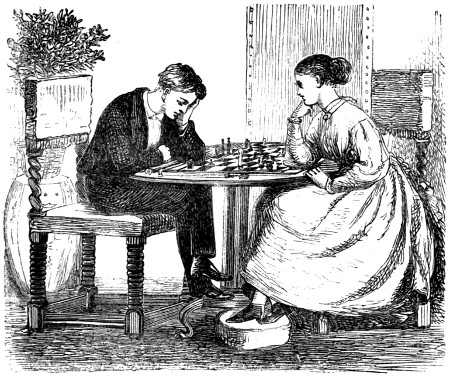 Boy and girl playing chess