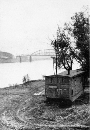 The waterside at Martin’s Ferry. Near this spot stood
the little brick house in which Mr. Howells was born.