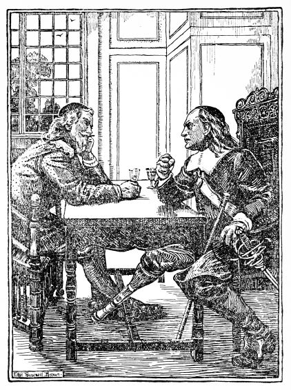 two men talking at table